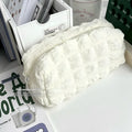 Cream Puff fabric pencil case in beige or black colour for pen and pencil organisation