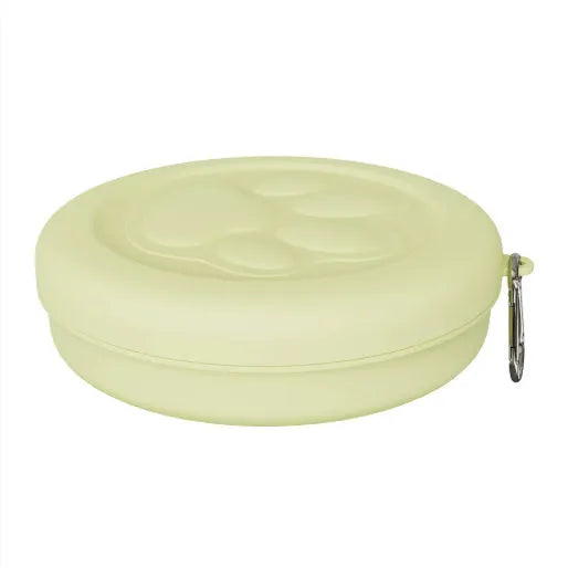 Portable plastic dog feeding bowl in green and pink colour options for outdoor use