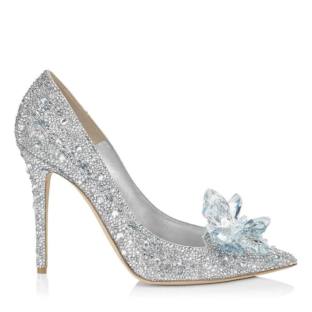 Women's gold high heels with pointed toes, rhinestone decoration, and stiletto heel