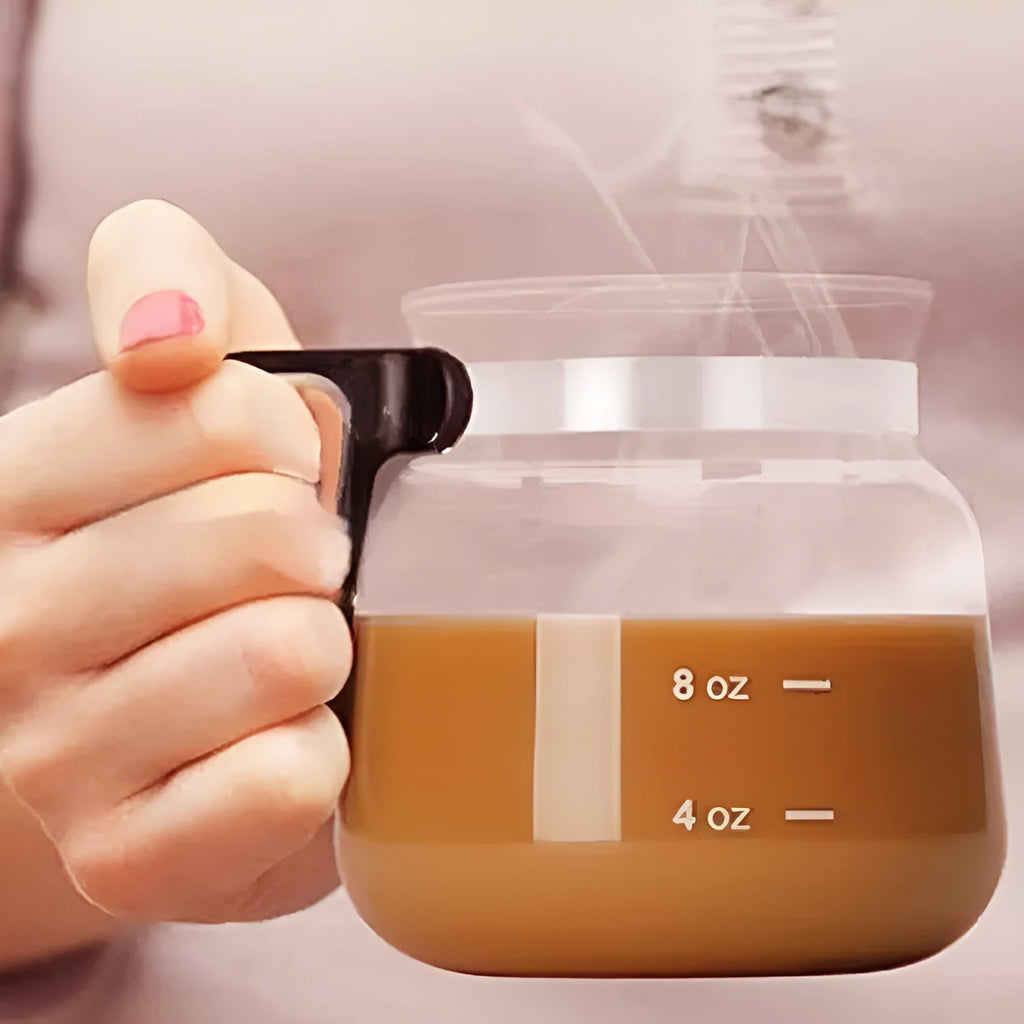 Transparent borosilicate glass coffee maker with silicone cover showing 355-473ml capacity range