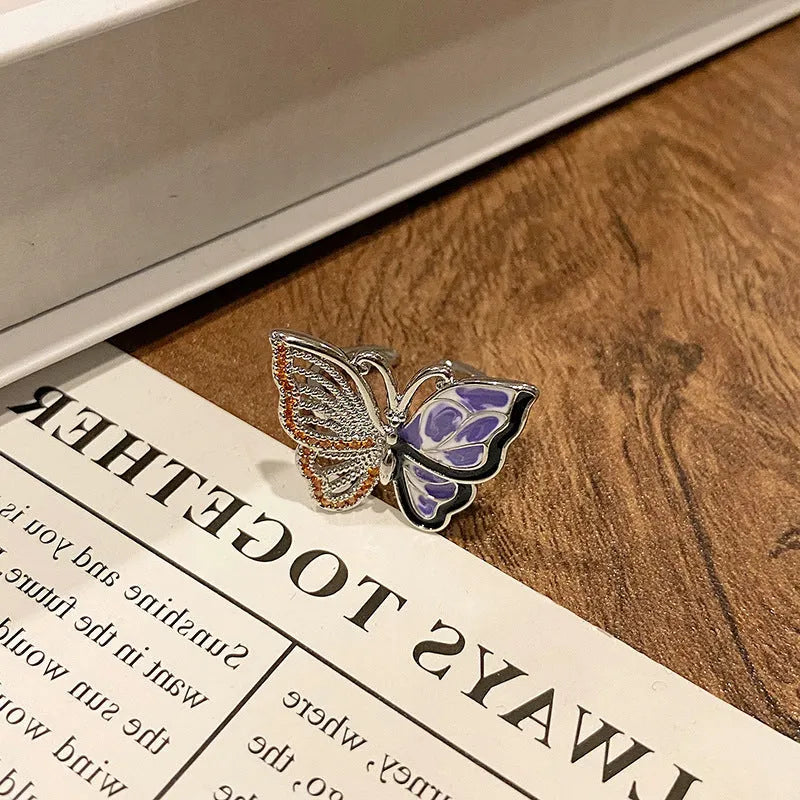 Butterfly design copper ring with oil-drip textured finish in women's jewellery