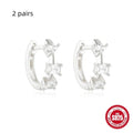 Sterling silver geometric stud earrings with a small round shape and classic diamond detail on a white background.