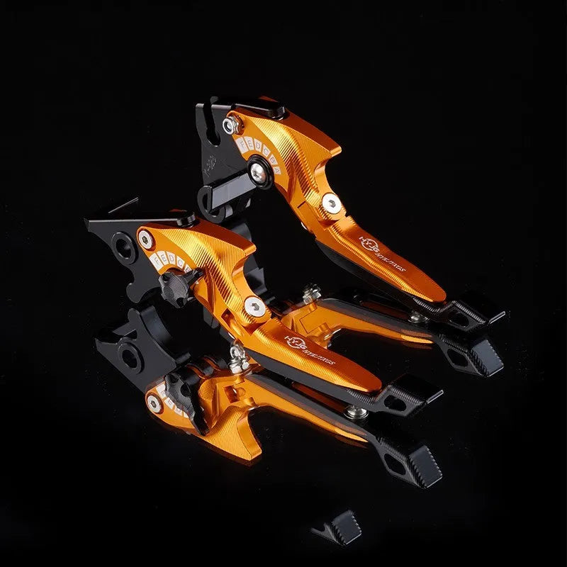 Pair of anodised metal motorcycle horn handle clutch levers with six-speed adjustable length, shown in a selection of colour finishes