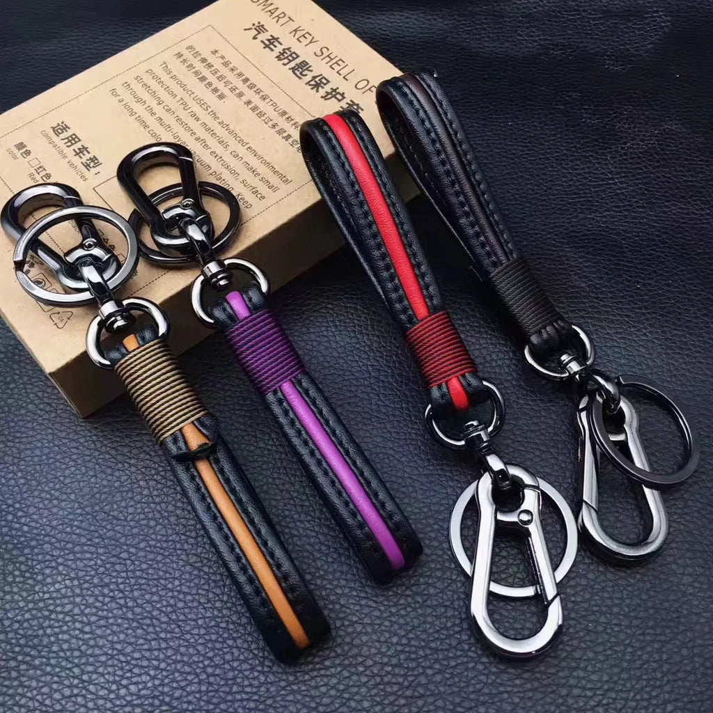 Handmade plastic keychain with horseshoe buckle in gun black finish and red key cover