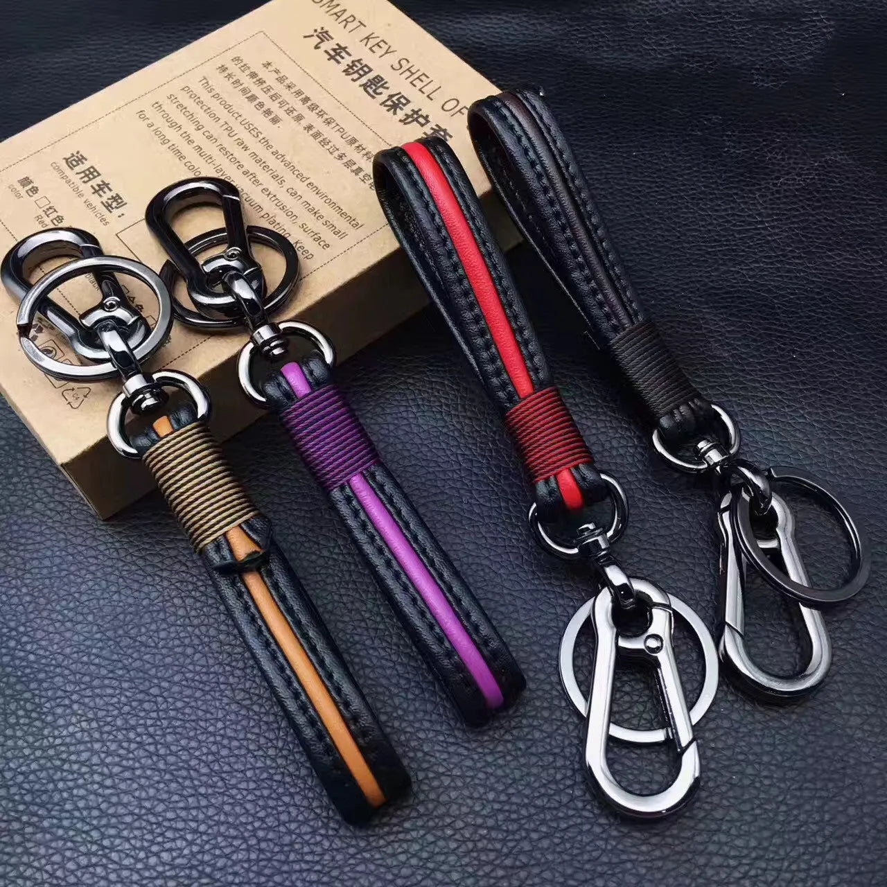 Handmade plastic keychain with horseshoe buckle in gun black finish and red key cover