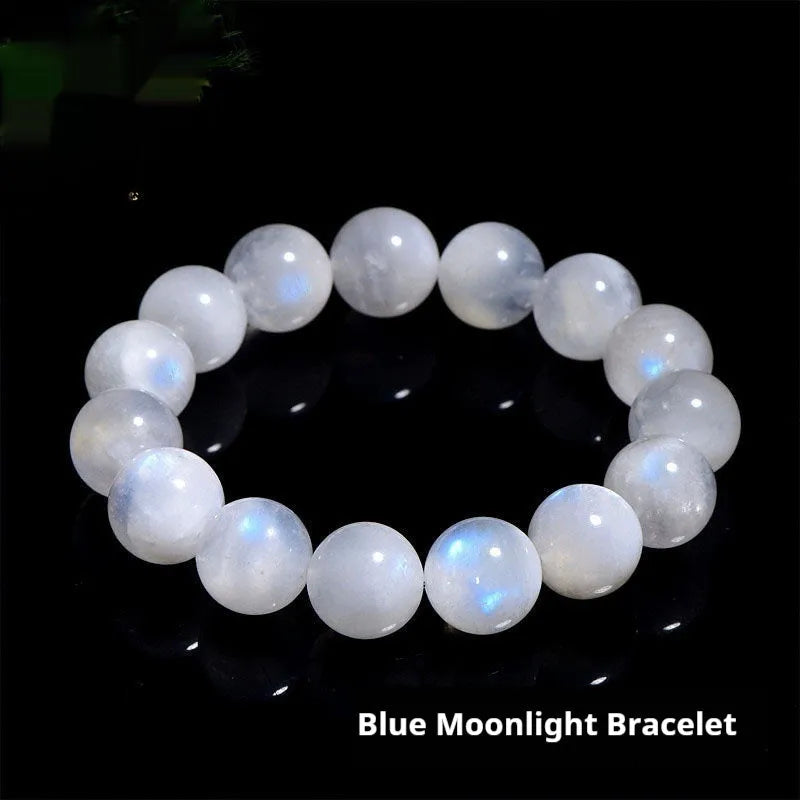 Natural blue moonlight round bead moonstone bracelet showing polished stone beads on wrist