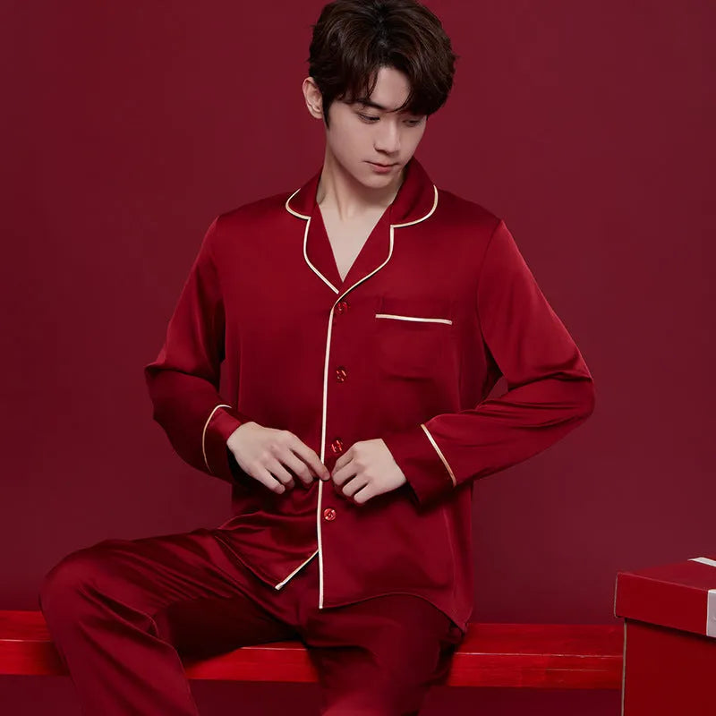 Red long sleeve polyester pyjama set for men and women on hangers