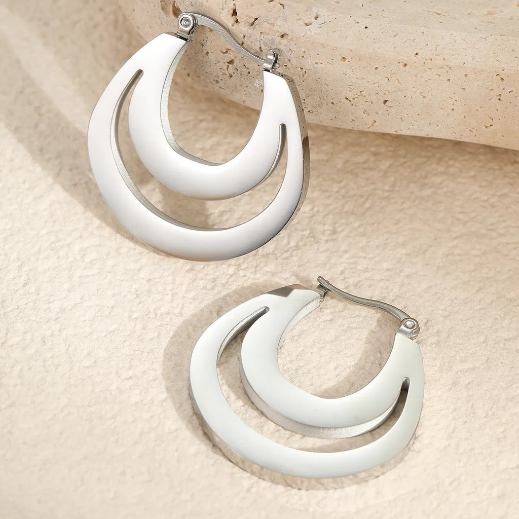 Geometric French earrings with round ring elements in 18K gold plated stainless steel, gold and steel colour options