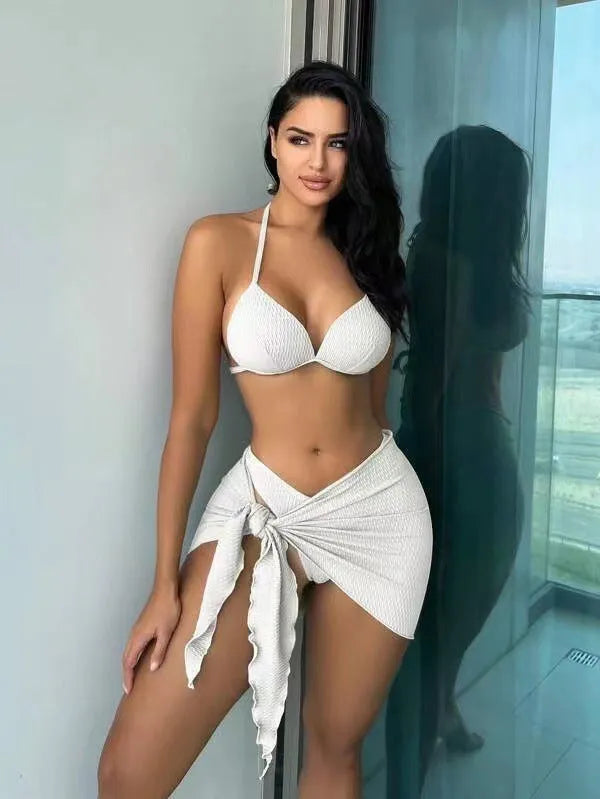 Women's black Russian split three-piece swimsuit set showing top, panties, and skirt on a model.