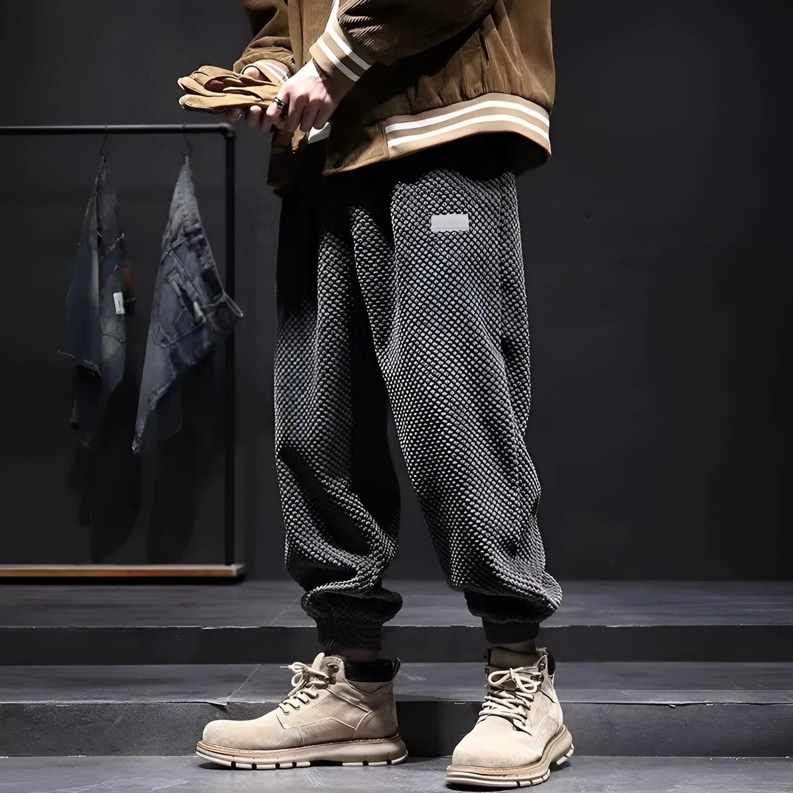 Grey men's straight-leg sweatpants with an ankle tie fastening on the hem.