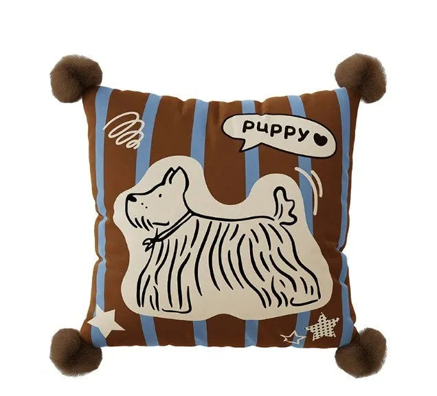 Blue cartoon animal print cushion and matching pillowcase on a sofa