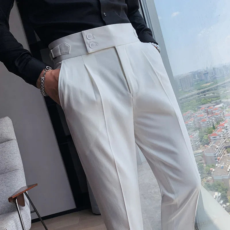 Straight-leg casual trousers in solid colour on hanger showing waistband and leg detail