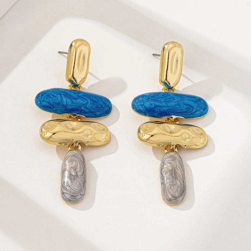 Geometric shaped stud earrings with multicolour electroplated finish on zinc alloy