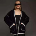 Lace-up knitted cardigan in camel colour with loose fit and mid-length design