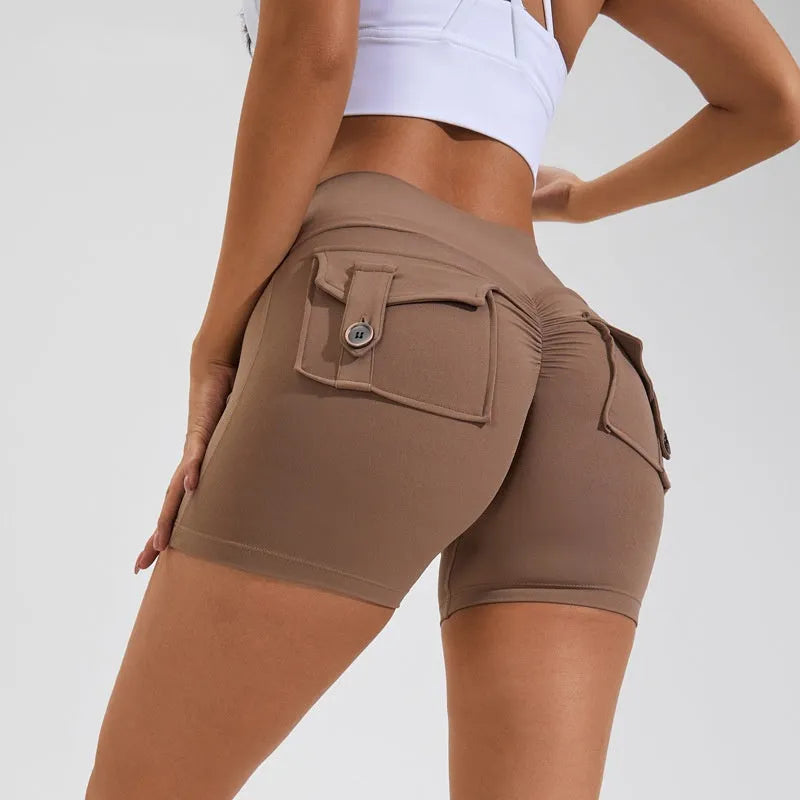 Women's high waist hip lifting sports shorts with side pockets in electric blue colour