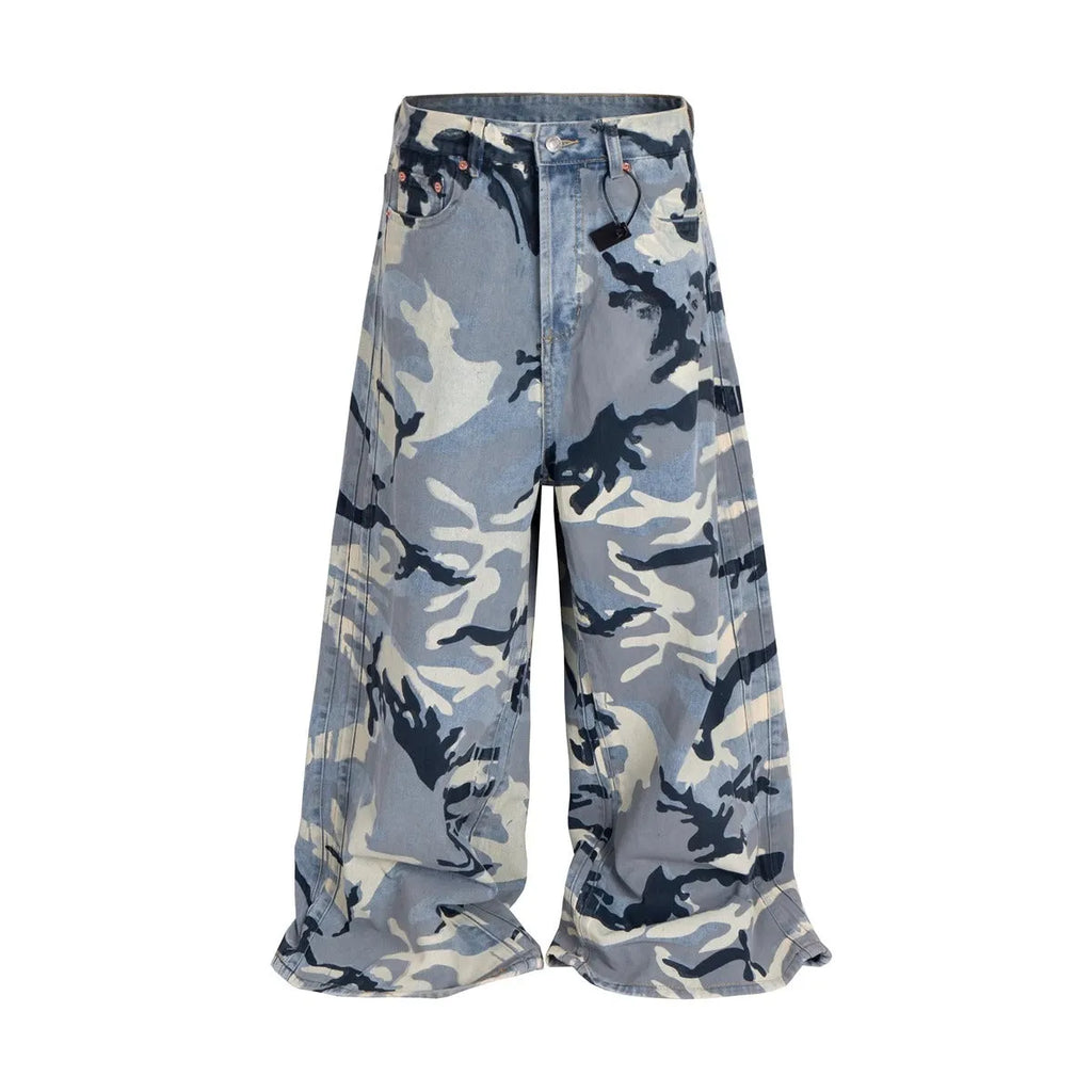 Man and woman modelling loose-fit jeans in a blue snow camouflage pattern with stretch denim fabric.