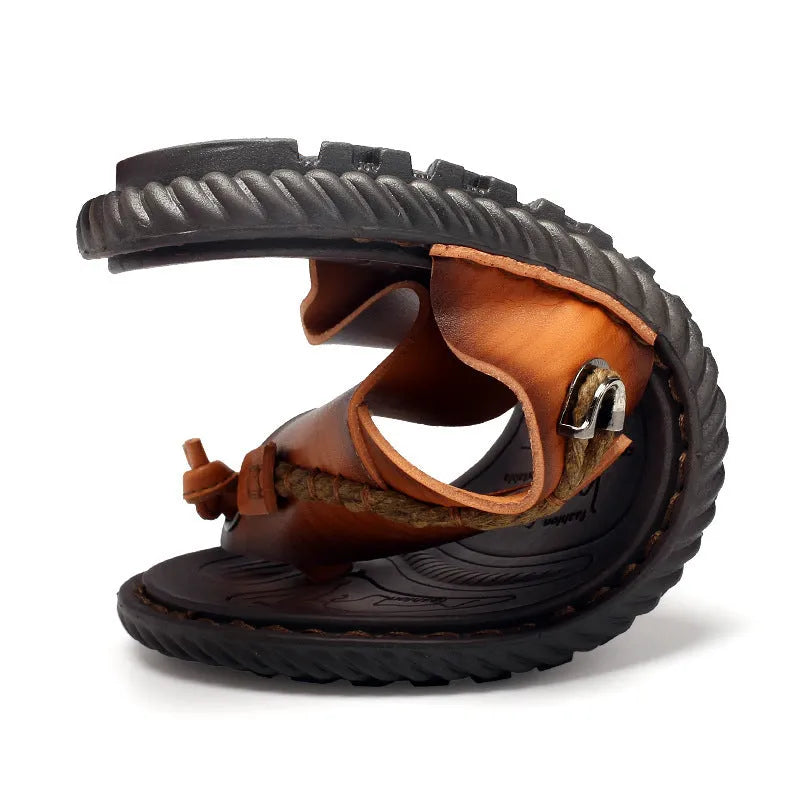 Men's dark blue herringbone pattern outdoor slippers with rubber sole and leather lining.