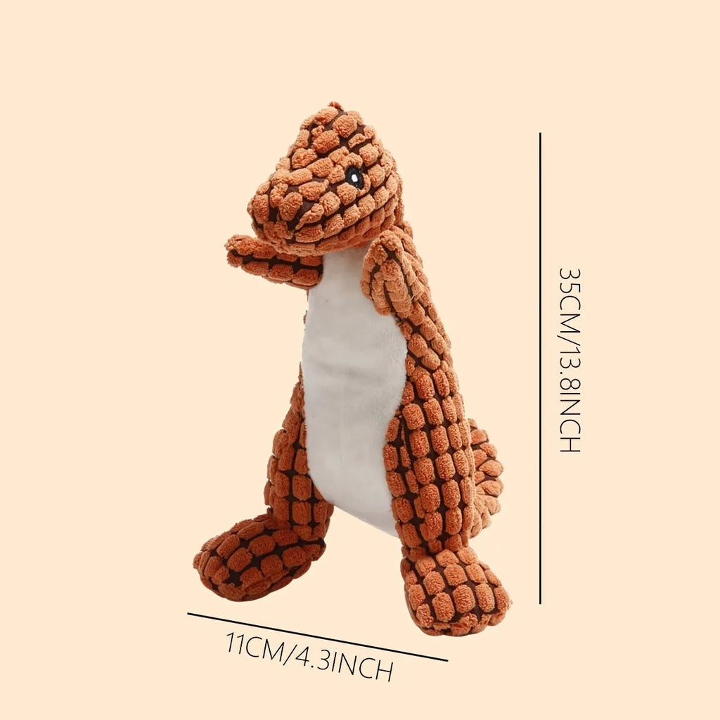 Grey, green, and orange coloured dog chew toy with sound, shown with size scale.
