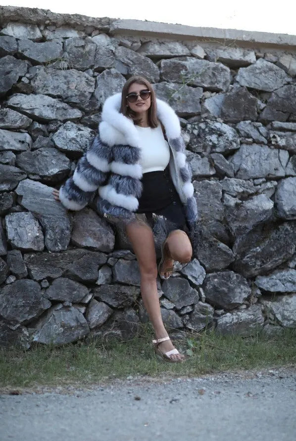 Women's loose artificial fur coat with hood in brown and white silver fox colour options, shown at 65cm length.