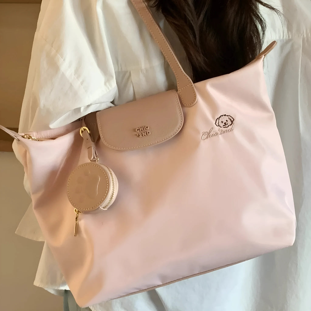 Oxford cloth tote bag in pink with horizontal square design and shoulder strap