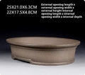 Handmade antique oval purple sand bonsai pot measuring 25x21x6.3cm