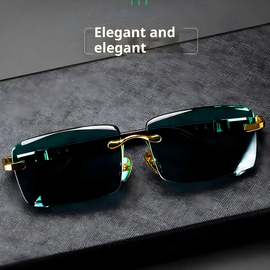 Dark green frameless crystal sunglasses shown with a glasses case and lens cloth.