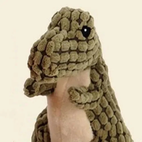 Grey, green, and orange coloured dog chew toy with sound, shown with size scale.