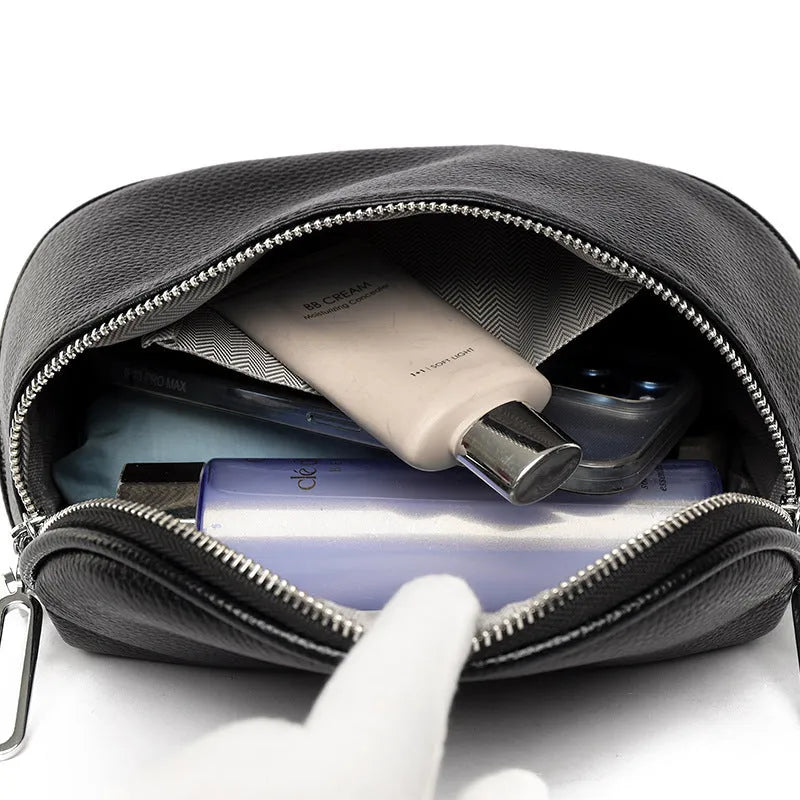Women's black PU leather casual messenger bag with saddle shape and cross-body strap