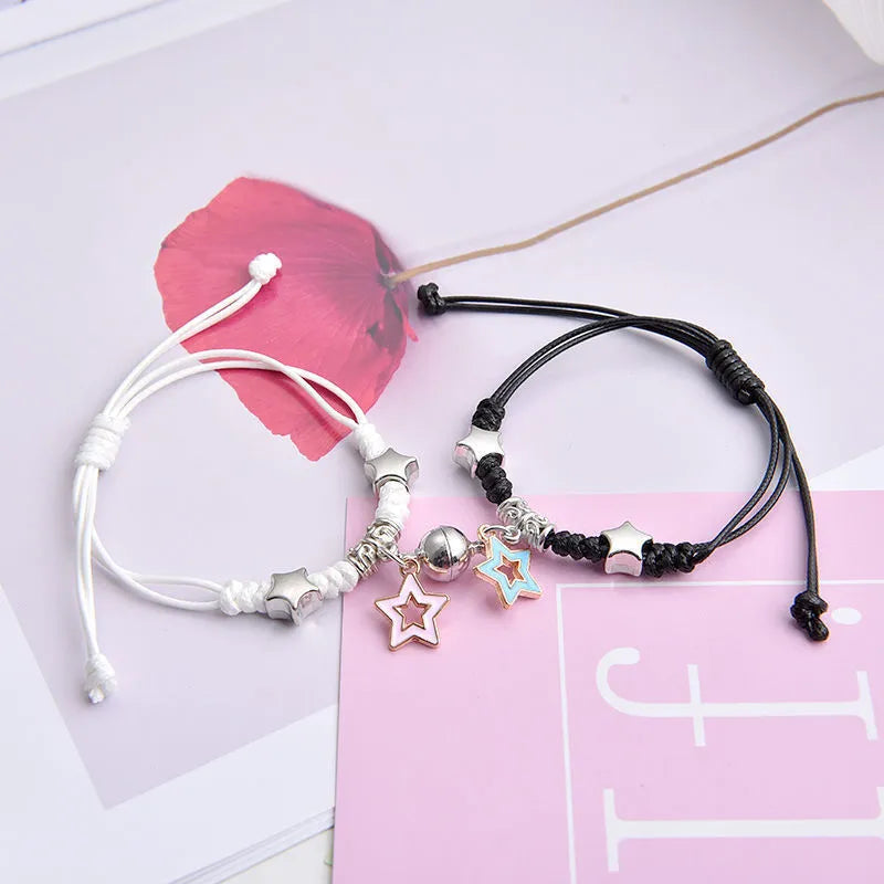 Magnetic couple bracelets with crown and diamond designs in alloy electroplated construction