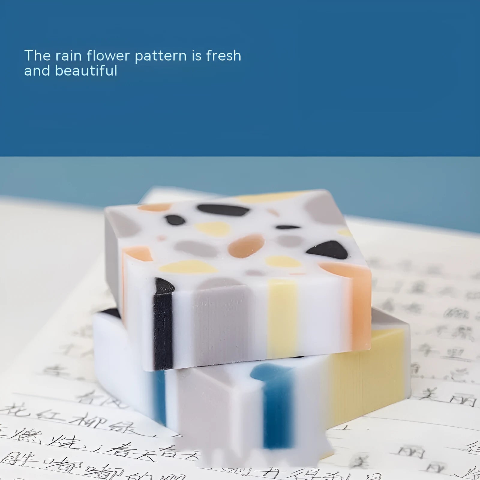 White brick-shaped rubber eraser for pencil marks with Super Clean Traceless branding
