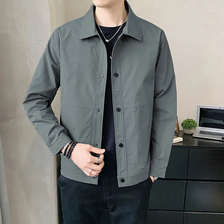 Korean style thin single-layer men's jacket in grey, showing long sleeves and front zip.