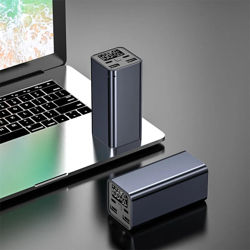 Black high power laptop charging bank showing metal case with 65W output and 20000mAh capacity.