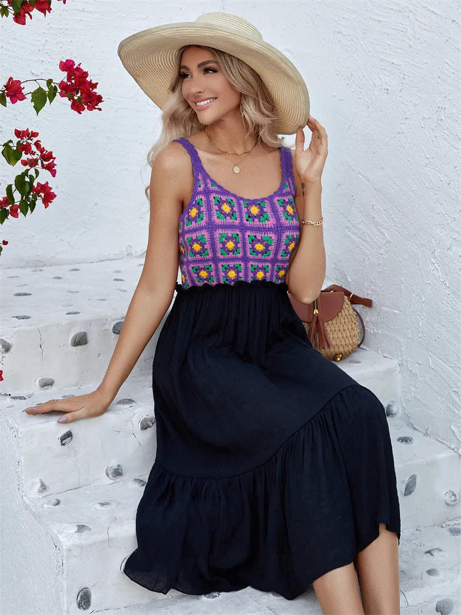 Purple sleeveless dress with hand-hooked floral embroidery pattern, modelled on an adult woman.