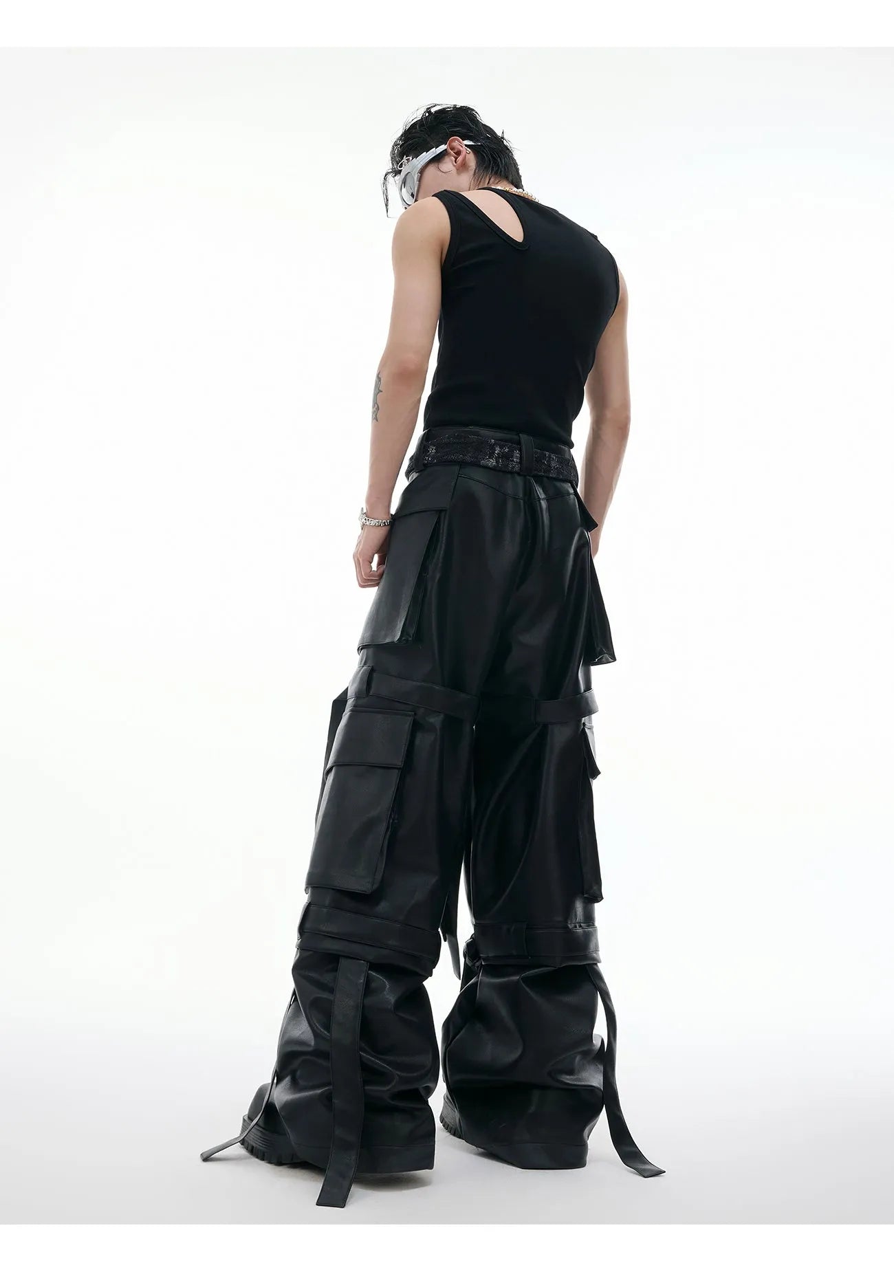 Black loose fit retro-style trousers with quilted stitching and multiple pockets