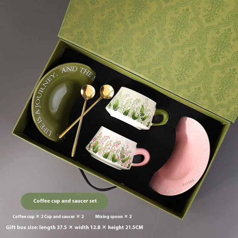 Ceramic coffee cup and saucer set with two 300ml cups, two saucers, and two spoons