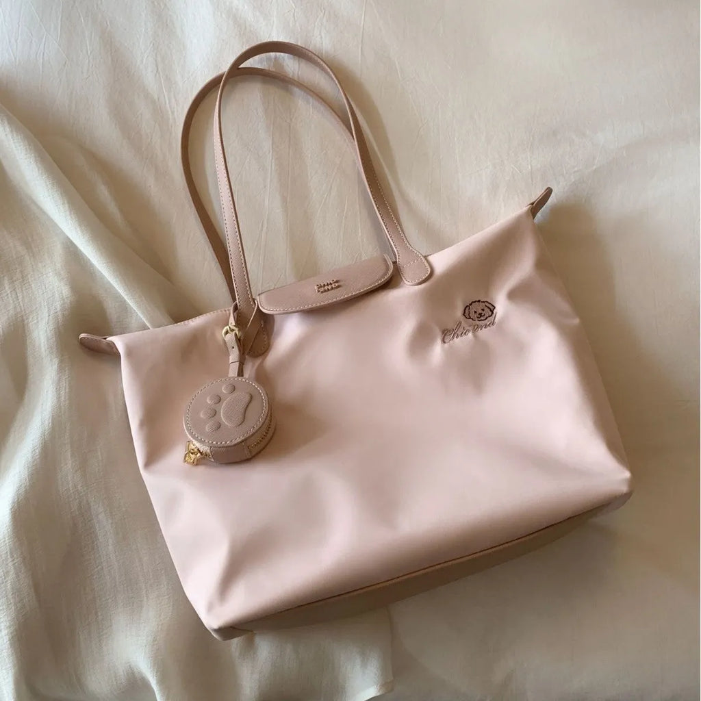 Oxford cloth tote bag in pink with horizontal square design and shoulder strap
