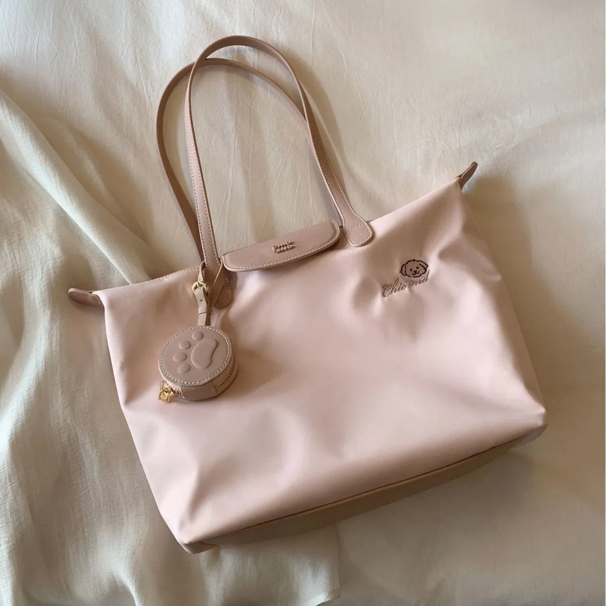 Oxford cloth tote bag in pink with horizontal square design and shoulder strap