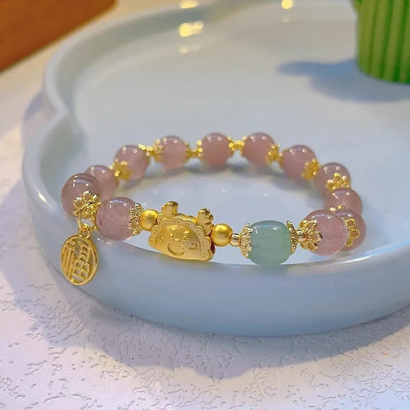 Glass floral glazed bracelet with zodiac animal charm in red, pink, and white pearl bead colours