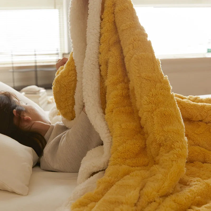 Polyester thermal flannel blanket in beige, folded to show texture and size.