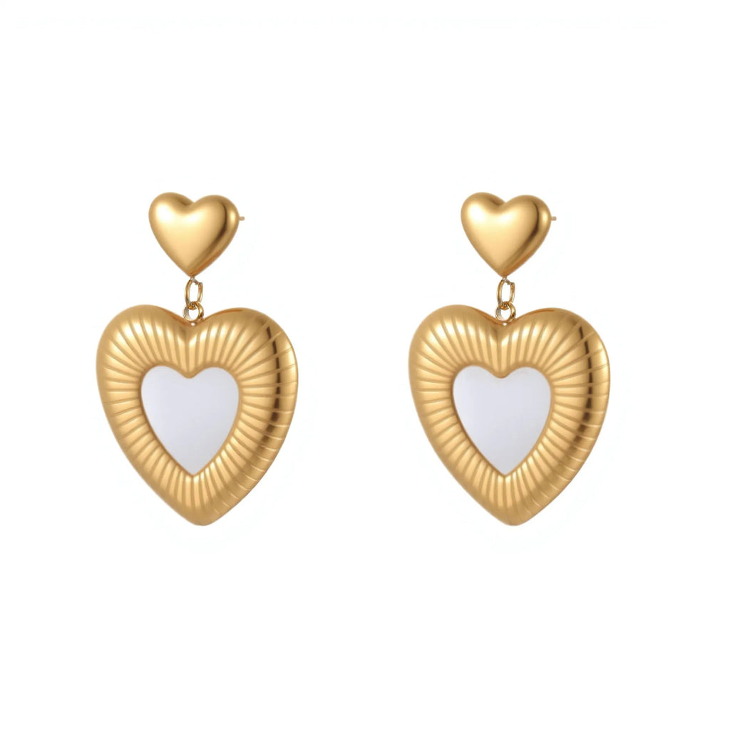 Gold heart-shaped stainless steel stud earrings for women with a love motif.