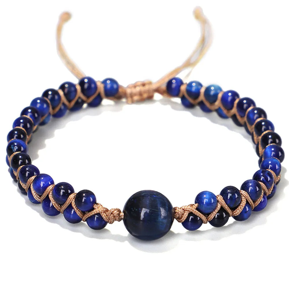 Handmade woven geometric bracelet with blue tigereye stone beads and adjustable pull closure.