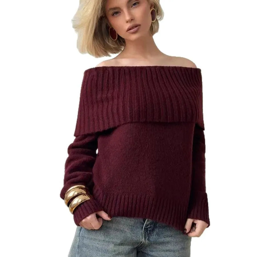 Woman wearing a grey off-the-shoulder strapless sweater with a 3D textured pattern.