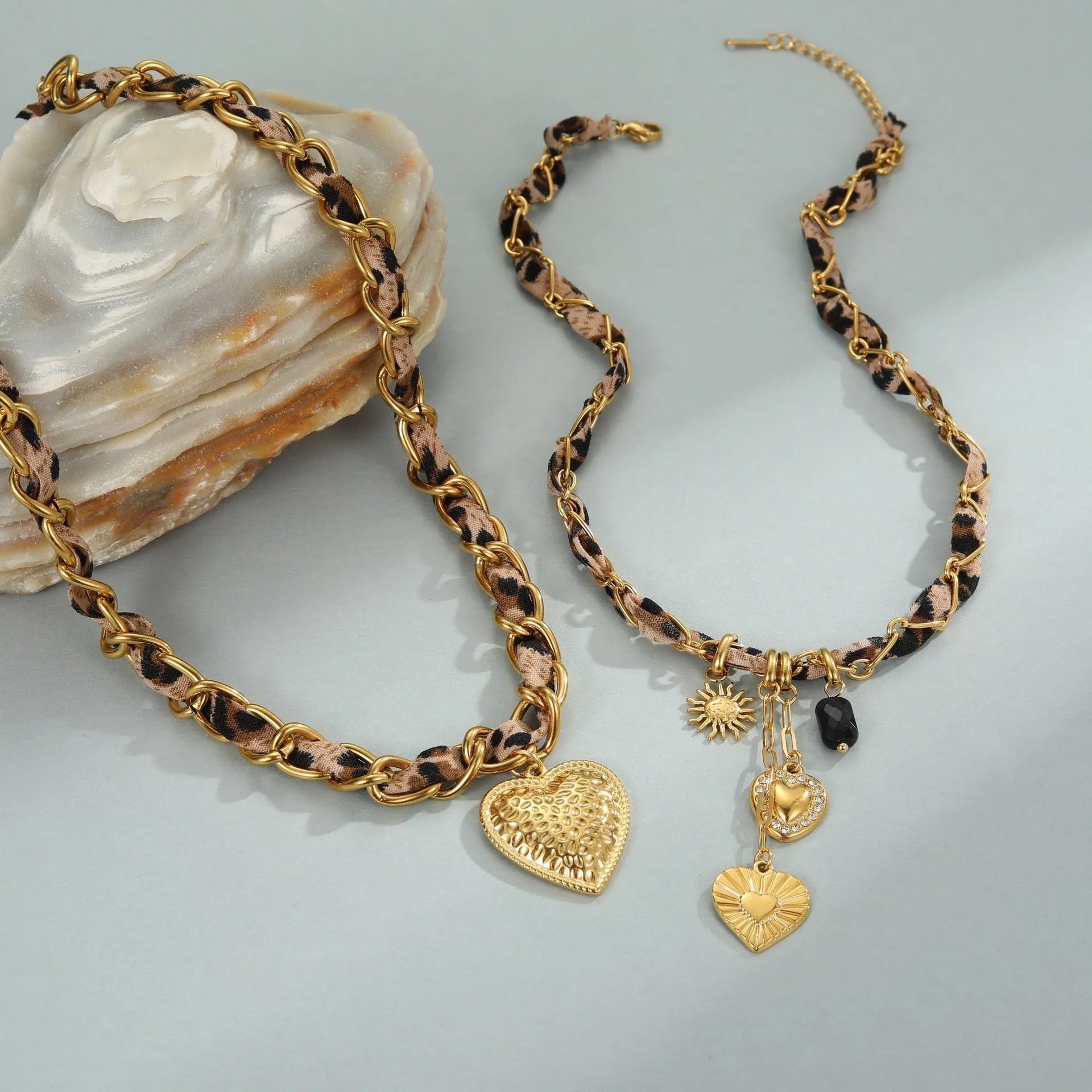 Stainless steel leopard love pendant necklace with adjustable chain and 18K gold electroplating