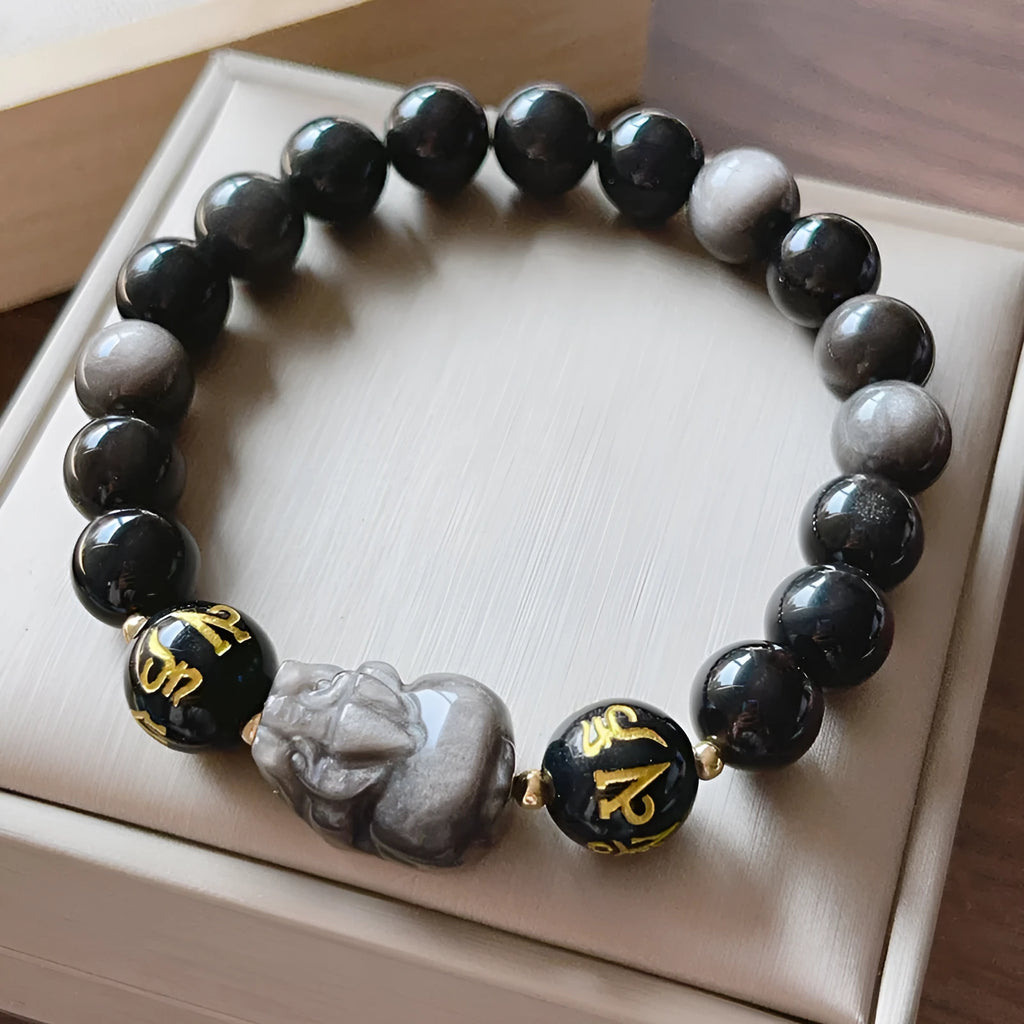 Man's Silverstone beaded bracelet with engraved Chinese proverbs and zodiac symbols.
