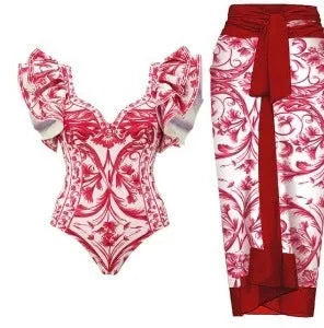 Women's printed one-piece swimsuit with a matching skirt cover-up in a rose pink floral pattern.