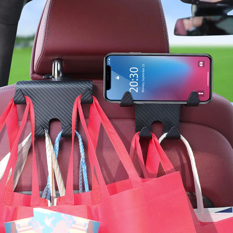 Black ABS plastic car hook and mobile phone bracket organiser for rear seat storage.