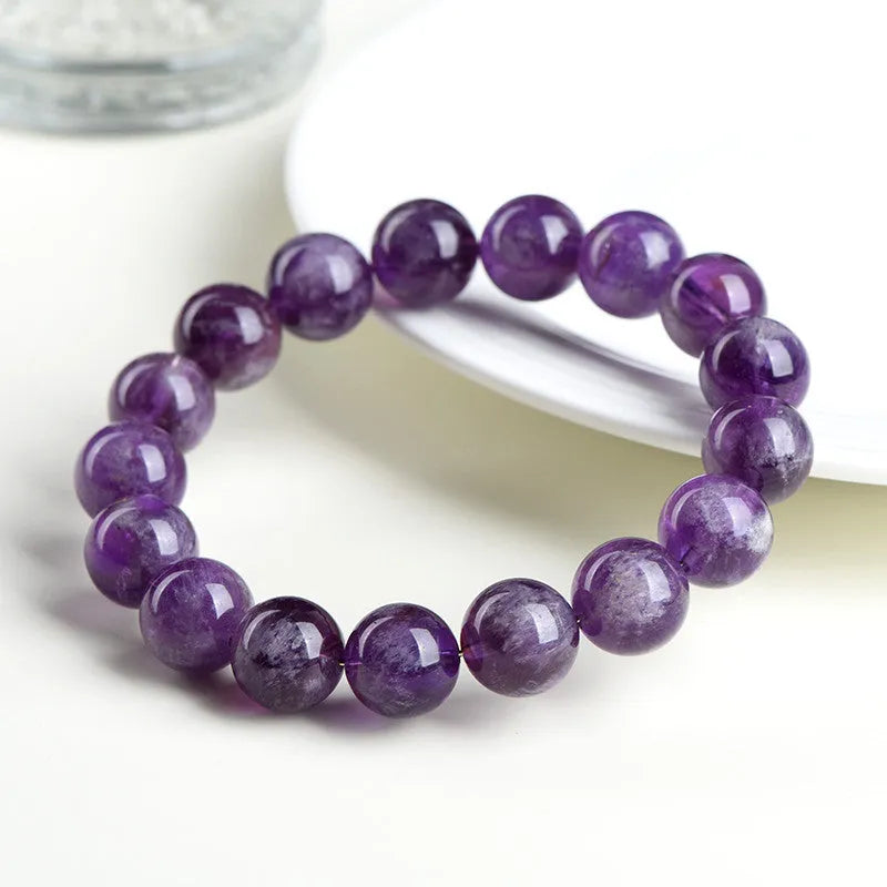 Natural feather amethyst Snow Mountain purple scattered bead crystal bracelet with ruyi charm.