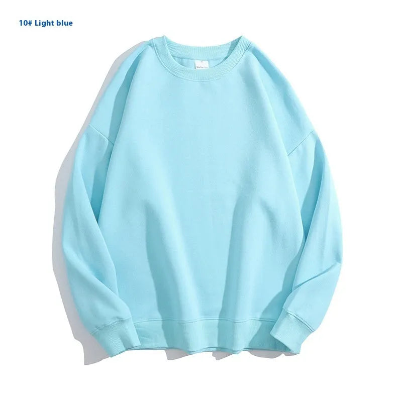 Women's loose fit cotton off shoulder sweater in a solid colour on a hanger.