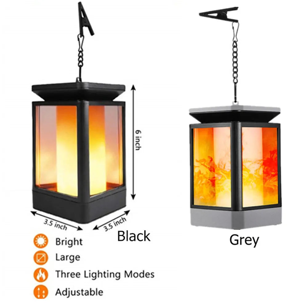 Black antique flame style solar LED outdoor street lamp with solar panel on top.