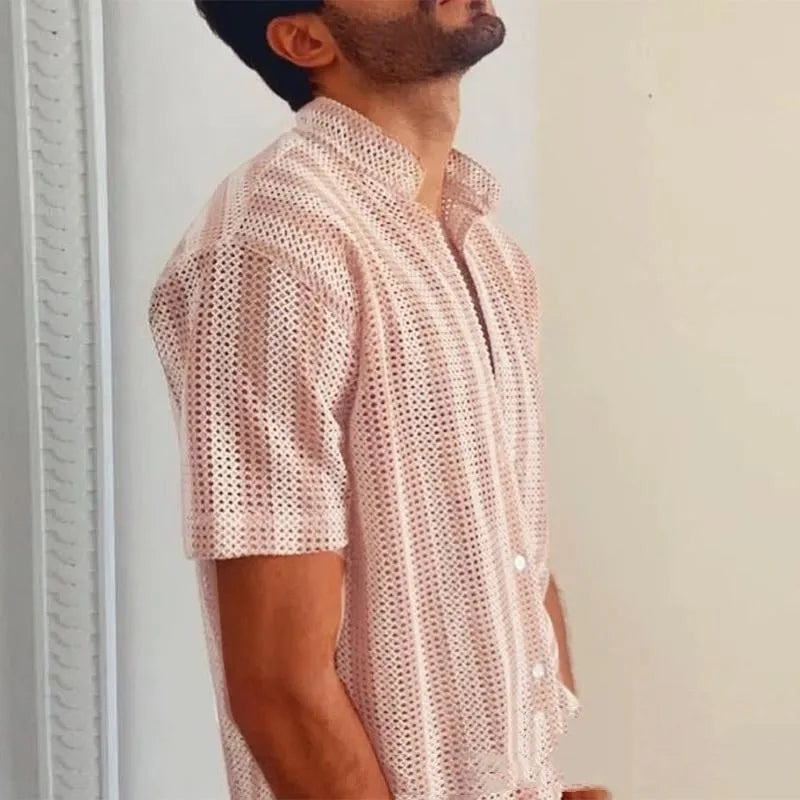 Pink men's loose-fit waffle texture short sleeve cardigan shirt on a hanger.